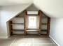 Accent shelving built with reclaimed wood beams